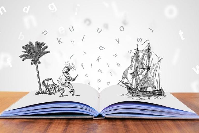 Letters flying out of an open book.  There are pencil drawings of a ship and skeleton pirate popping out of the book.