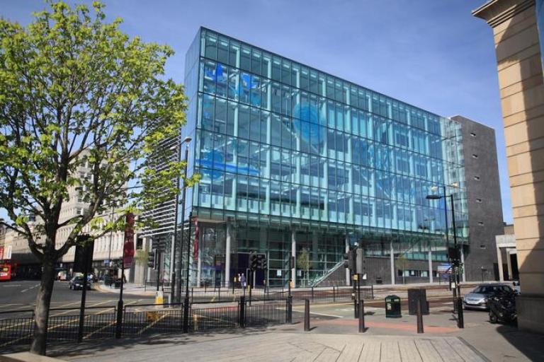 Newcastle City Library. A large glass building.