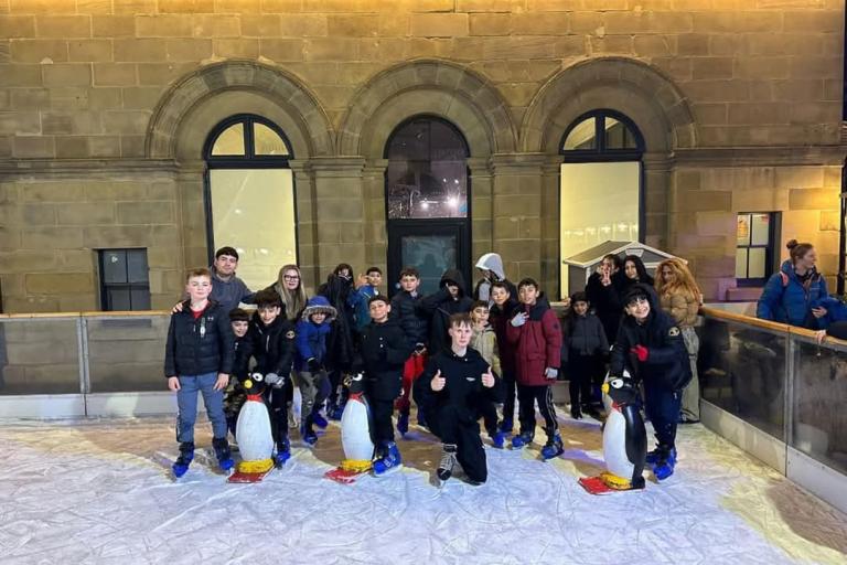 Young people ice-skating