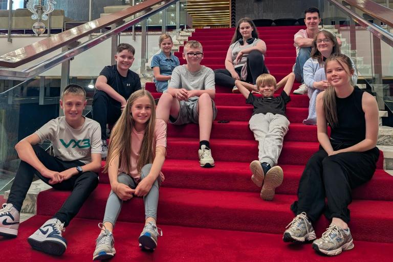Young inspectors on the stairs 