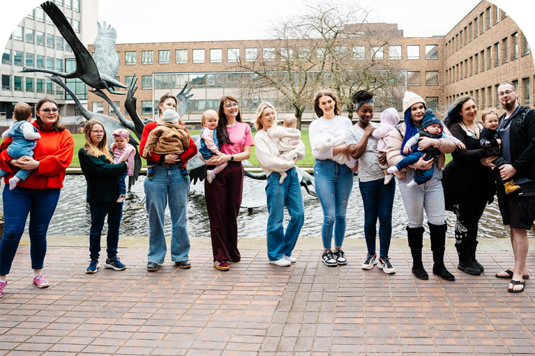 Large group of parents and babies 