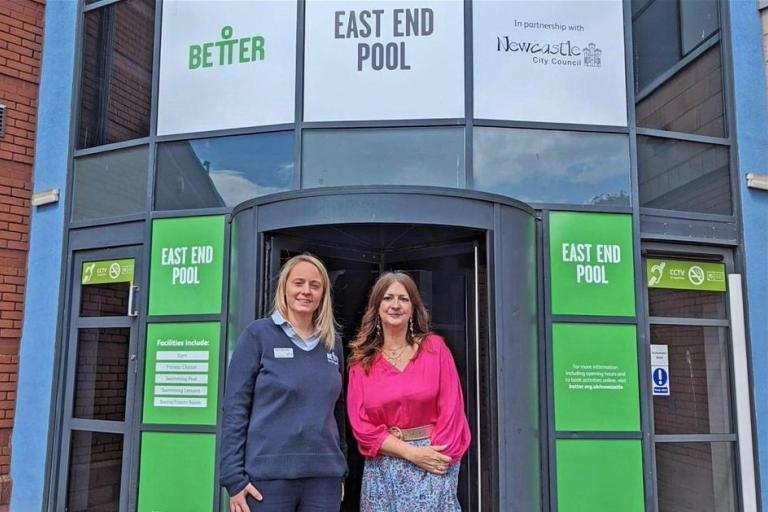 Two women standing in front of East End Pool in Newcastle