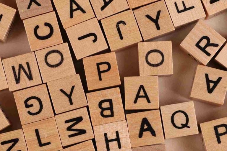 Close up wooden block with letters on them