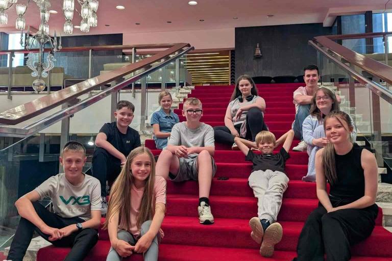 Young inspectors on the stairs 