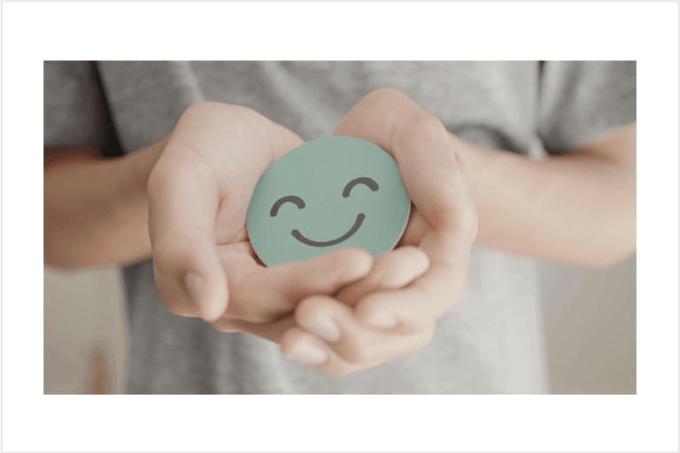 Smiley face in hands