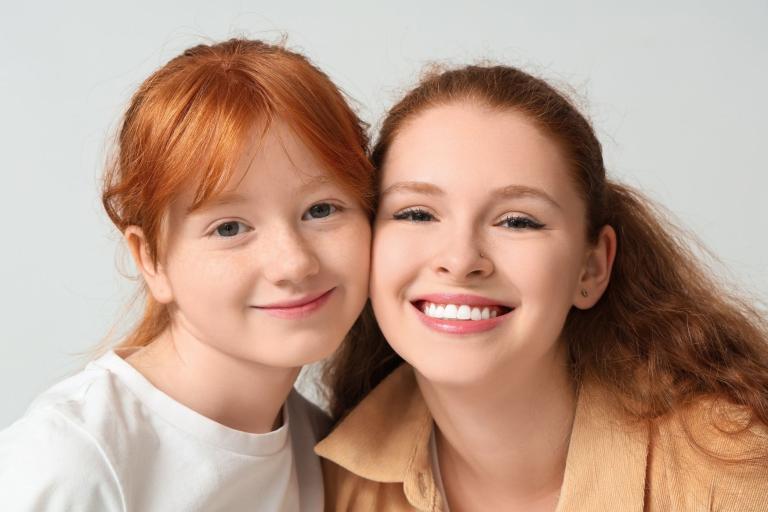 Female adult with girl