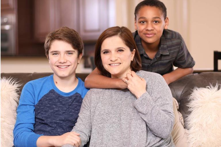 Adult female with two adolescent boys