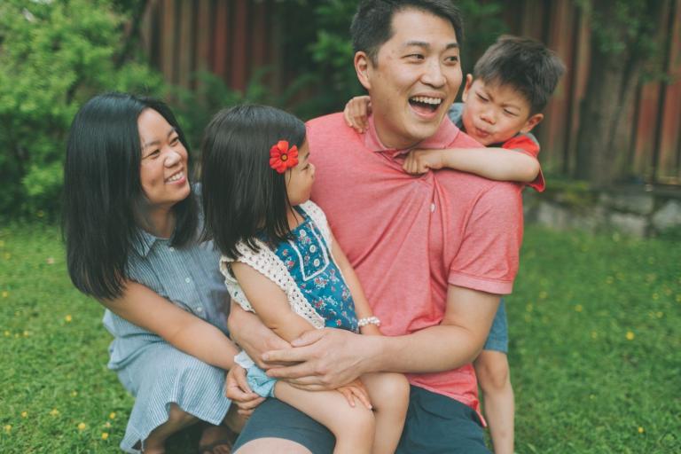 Couple with two children in garden