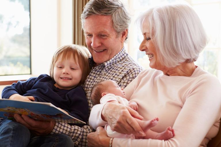 Grandparents with baby and toddler