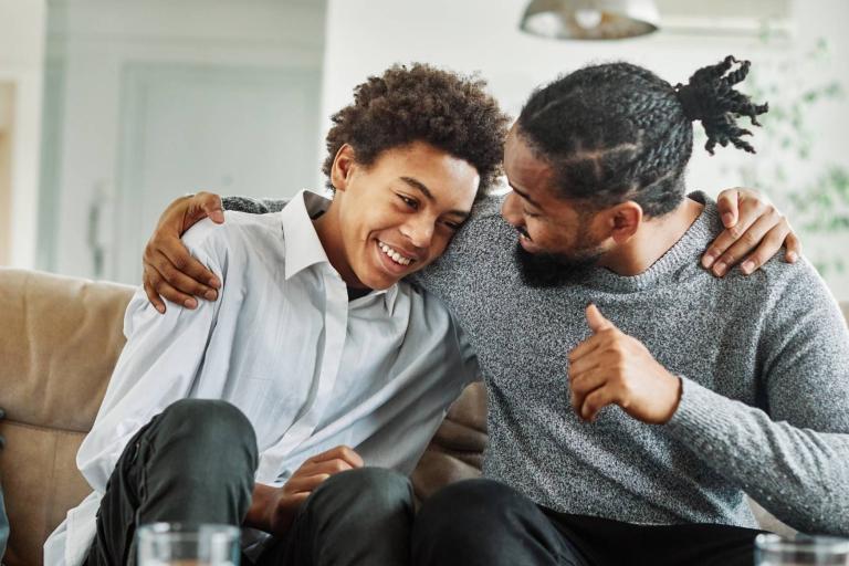 Adult male with teenage male