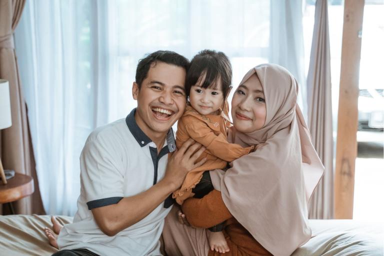 Couple with young girl