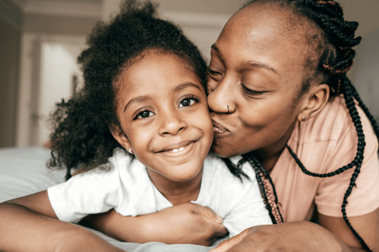 Mother and daughter smiling 