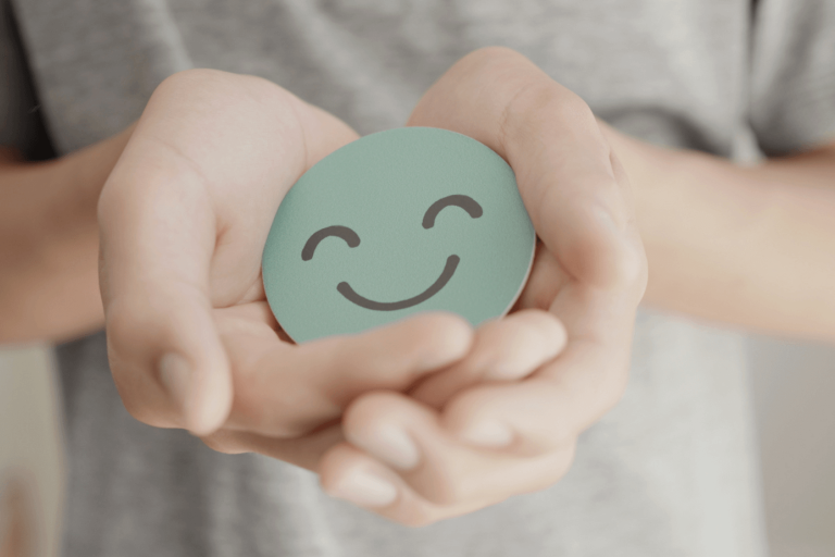 Smiley face in hands
