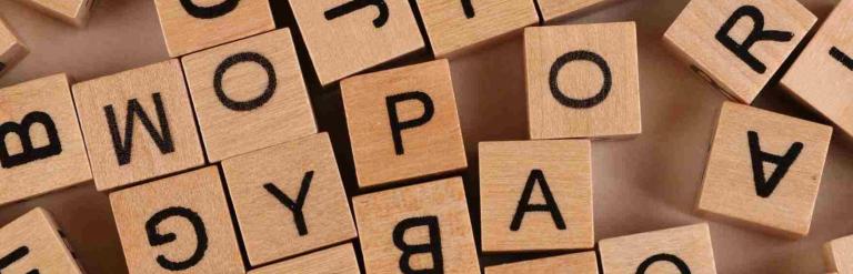 Close up wooden block with letters on them